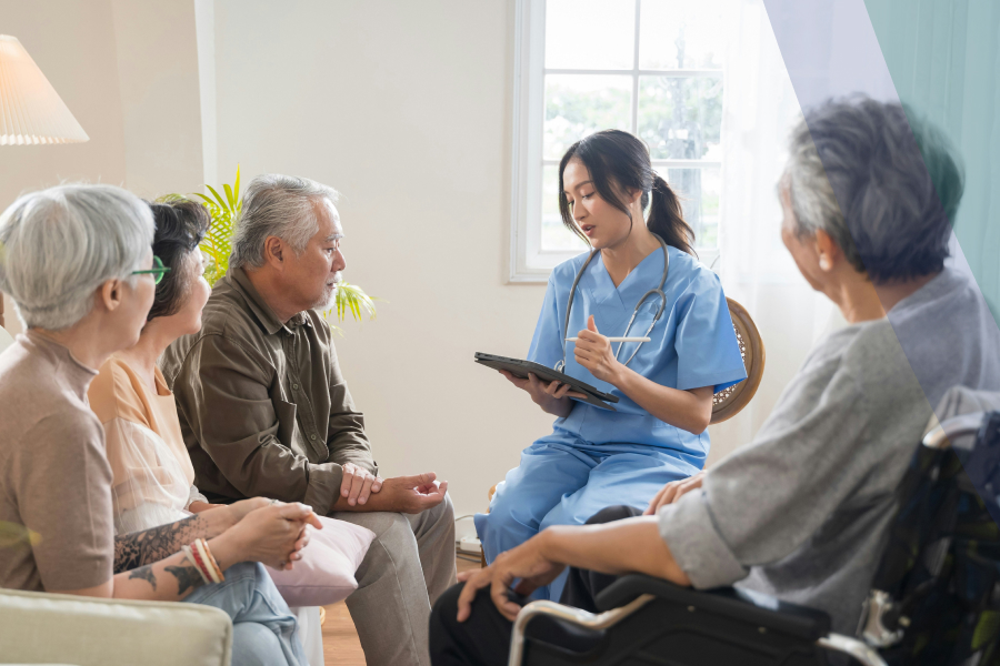 Physician speaking with a patient and their family members