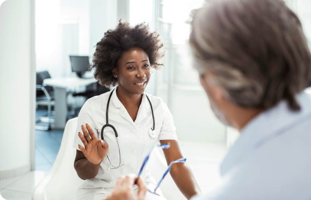 Physician speaking with patient